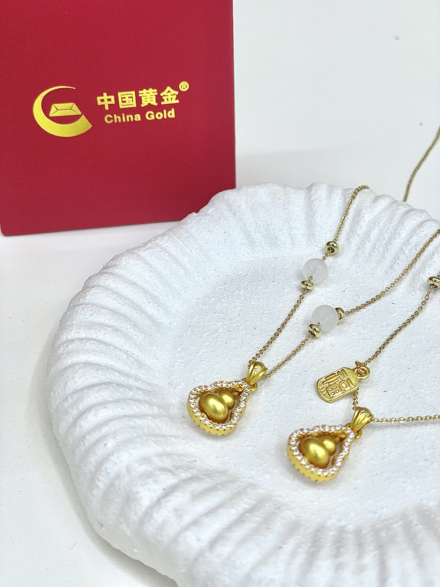 中国黄金获得外观设计专利授权：“项链（花轿喜事系列-幸福翩然）”